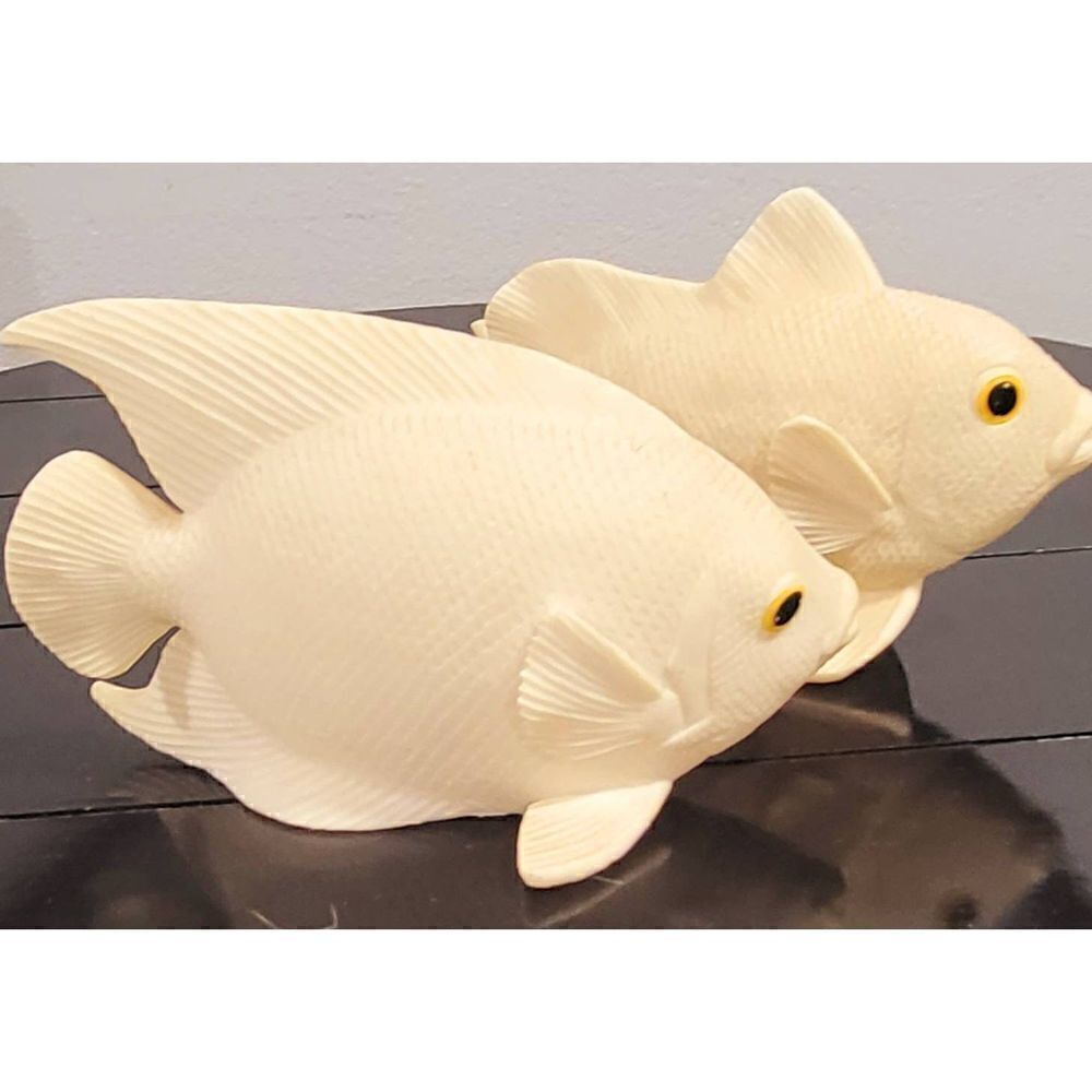 Vintage ceramic fish statues 
